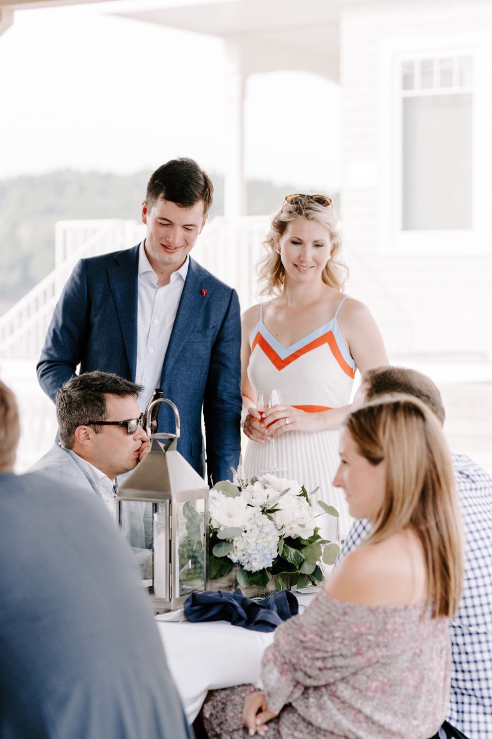 couple standing at outdoor dinner reception