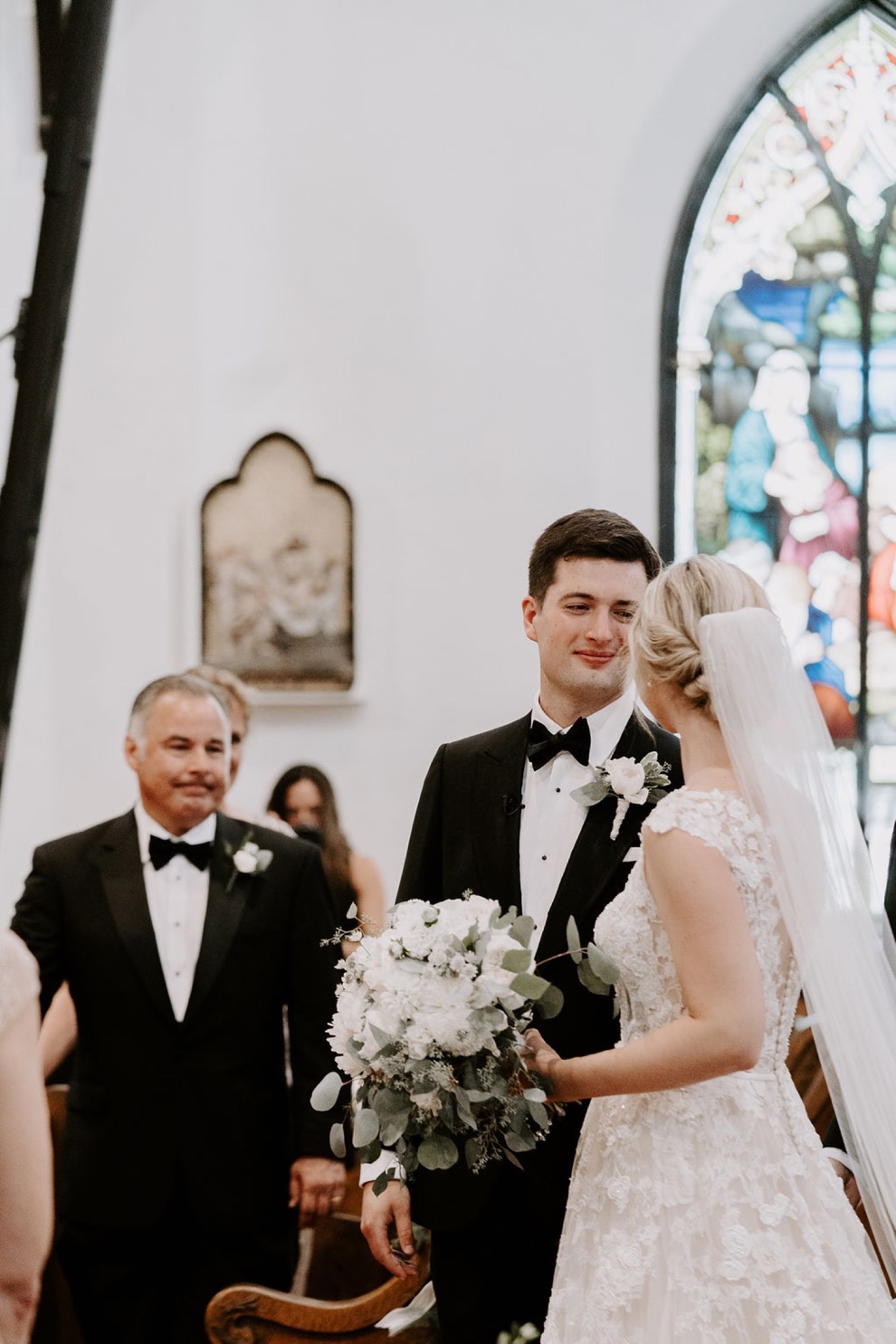 bride and groom at altar during church wedding ceremony