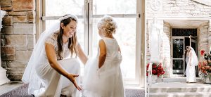 bride and flower girl on wedding day