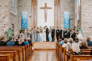 sacred heart catholic church wedding first kiss