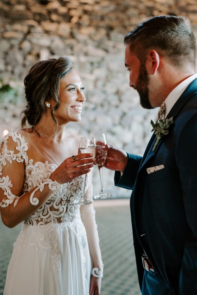 Bride and groom toast after sharing their vows
