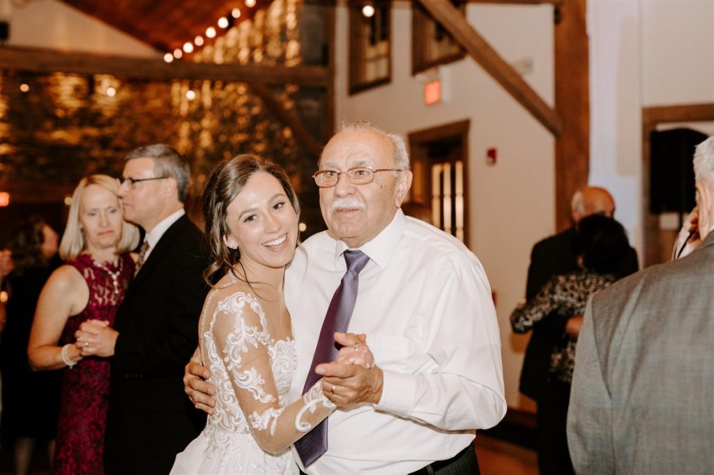 bride dances with grandfather at wedding