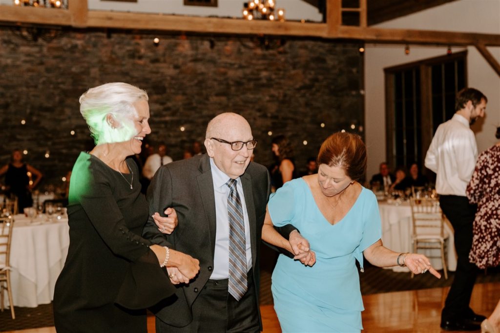 grooms mother and grandfather dance at wedding
